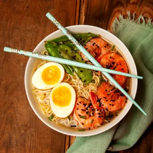 Japanese Chopsticks Over A Bowl Of Ramen Wallpaper