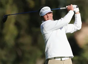 Jason Bohn In Confident Action On The Golf Course Wallpaper