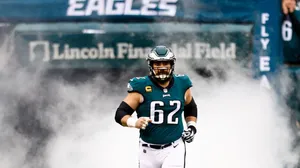 Jason Kelce In Action During A Football Game Wallpaper