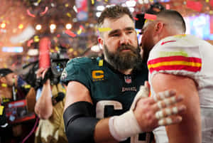 Jason Kelce In Action On The Football Field Wallpaper