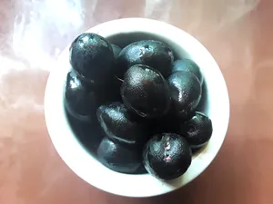 Java Plums Glossy Wooden Table Wallpaper