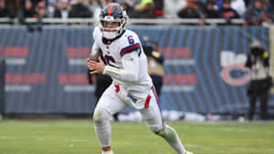 Jaxson Dart Football Action Wallpaper