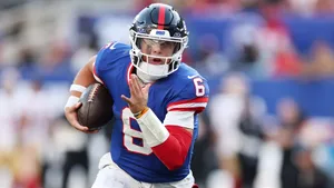 Jaxson Dart Football Action Wallpaper