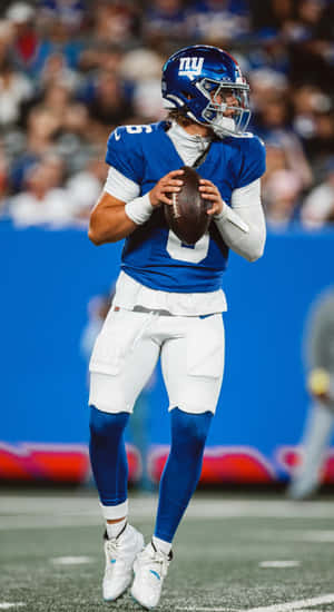 Jaxson Dart In Giants Uniform Wallpaper