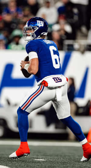 Jaxson Dart In Giants Uniform Wallpaper