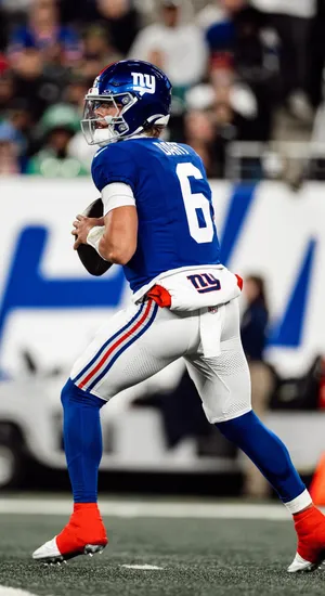 Jaxson Dart In Giants Uniform Wallpaper