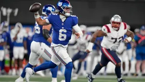 Jaxson Dart N F L Quarterback Action Wallpaper