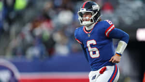 Jaxson Dart On Football Field Wallpaper