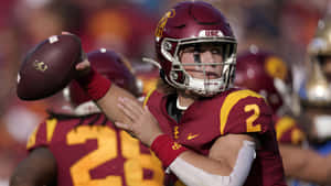 Jaxson Dart Passing Play Wallpaper