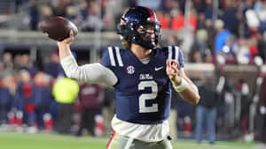 Jaxson Dart Throwing Pass Wallpaper