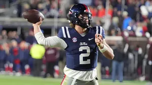 Jaxson Dart Throwing Pass Wallpaper