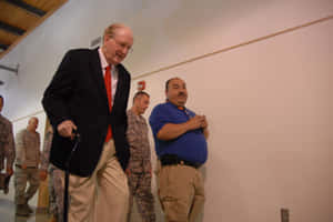 Jay Rockefeller Engaging With His Extended Reach Wallpaper