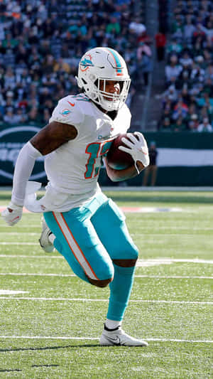 Jaylen Waddle Miami Dolphins Game Action Wallpaper