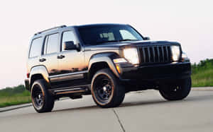 Jeep Liberty - A Powerful Off-road Adventure Wallpaper