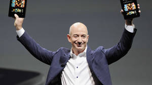 Jeff Bezos On A Dark Backdrop Wallpaper