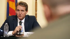 Jeff Flake Talking While Holding Microphone Wallpaper