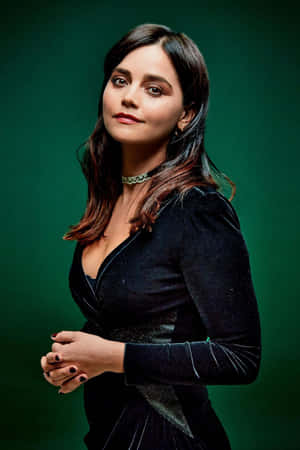 Jenna Coleman Posing Elegantly In A Photoshoot Wallpaper