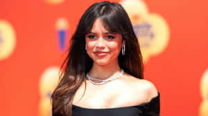 Jenna Ortega Red Carpet Elegance Wallpaper