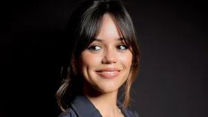 Jenna Ortega Smiling Portrait Wallpaper