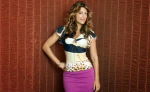 Jennifer Esposito Posing Confidently In An Elegant Dress Wallpaper