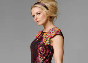 Jennifer Morrison Smiling Radiantly At A Photoshoot Wallpaper