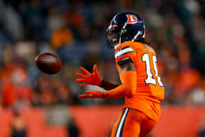 Jerry Jeudy Catching Football Game Wallpaper