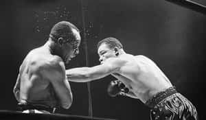 Jersey Joe Walcott And Joe Louis 1947 Fight Wallpaper