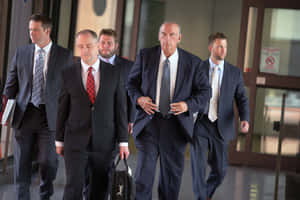 Jesse Ventura Posing In Court During A Lawsuit Wallpaper