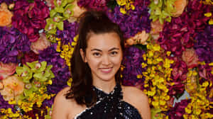 Jessica Henwick Floral Backdrop Wallpaper