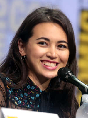 Jessica Henwick Speakingat Event Wallpaper