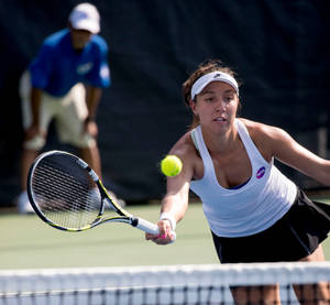 Jessica Pegula Reaching For Tennis Ball Wallpaper