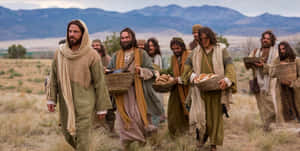 Jesus And His Disciples Gathered By The Sea Wallpaper