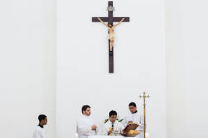 Jesus On Cross Above Mass Wallpaper