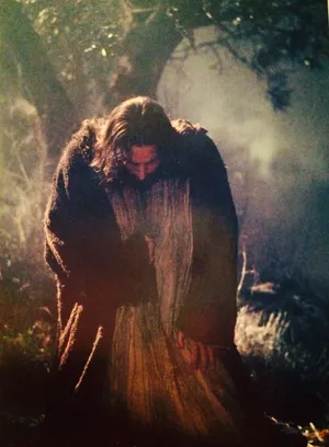 Jesus Praying In Redemption Wallpaper