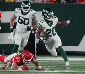 Jets_ Running_ Back_ Breece_ Hall_ Action_ Shot Wallpaper