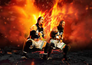 Jey Uso And Jimmy Uso On Fire Wallpaper