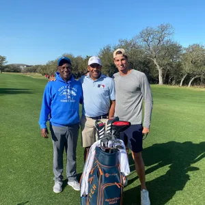 Jhonattan Vegas With Two Golfers Wallpaper