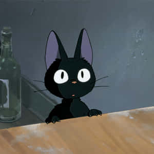 Jiji The Black Cat From Studio Ghibli's Kiki's Delivery Service Sitting On A Wooden Branch Wallpaper