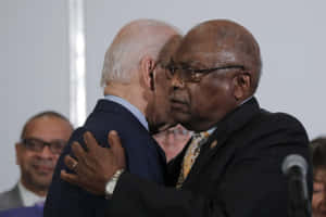 Jim Clyburn Hugging Joe Biden Wallpaper