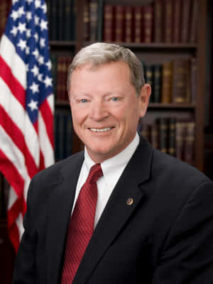 Jim Inhofe Portrait With American Flag Wallpaper