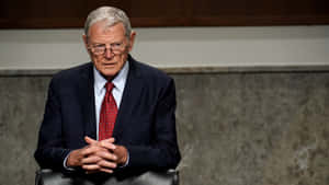 Jim Inhofe With Interlocked Fingers Wallpaper