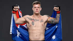 Jimmy Crute Flexing With Australian Flag Wallpaper