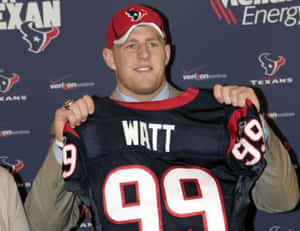 Jj Watt In Action With The Houston Texans Wallpaper