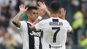 Joao Cancelo And Cristiano Ronaldo Wallpaper