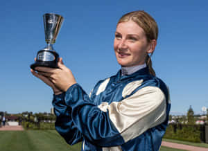 Jockey Sensation Jamie Kah In Action Wallpaper