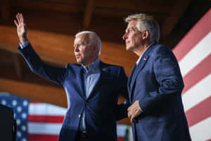 Joe Biden Standing With Terry Mcauliffe Wallpaper