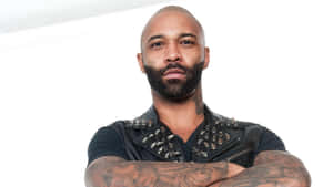 Joe_ Budden_ Confident_ Pose Wallpaper