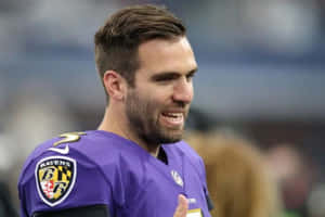 Joe Flacco Smilingin Ravens Uniform Wallpaper