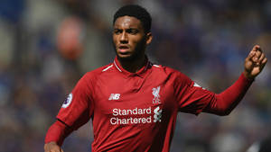 Joe Gomez Looking Tense During Game Wallpaper