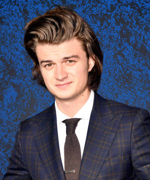 Joe Keery In Plaid Suit Wallpaper